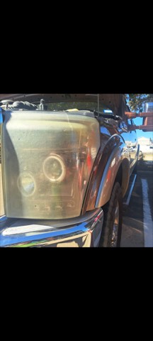 Truck headlight before restoration, hazy and oxidized