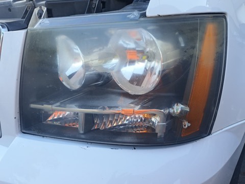Truck headlight before restoration, hazy and oxidized