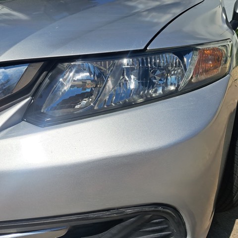Sedan headlight after restoration, fully clear
