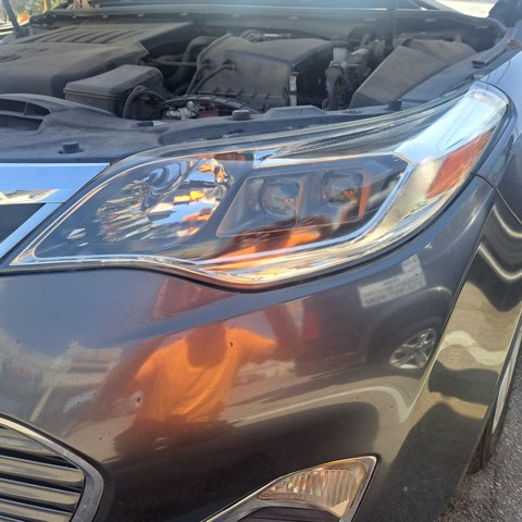 SUV headlight after restoration, fully clear