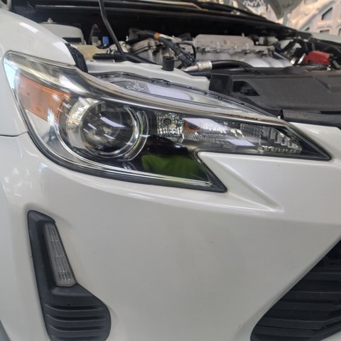 Sedan headlight after restoration, fully clear