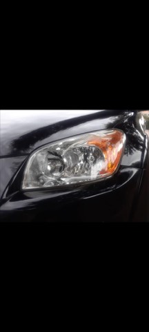 Sedan headlight after restoration, fully clear