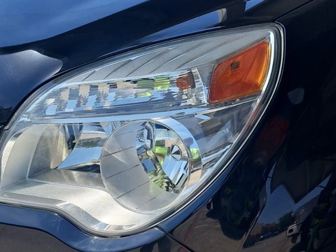Sedan headlight after restoration, fully clear