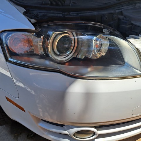 Sedan headlight after restoration, fully clear
