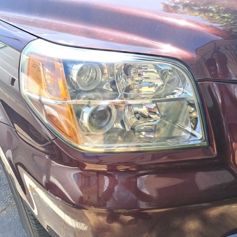 Sedan headlight after restoration, fully clear