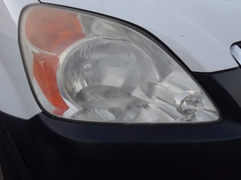 Sedan headlight after restoration, fully clear
