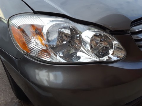 Sedan headlight after restoration, fully clear