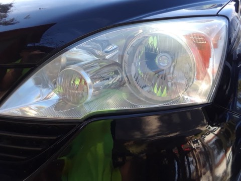 Sedan headlight after restoration, fully clear