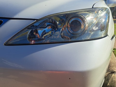 Sedan headlight after restoration, fully clear