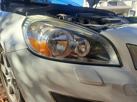 Sedan headlight after restoration, fully clear
