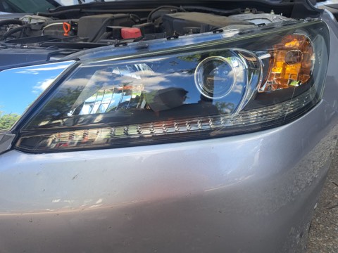 Sedan headlight after restoration, fully clear